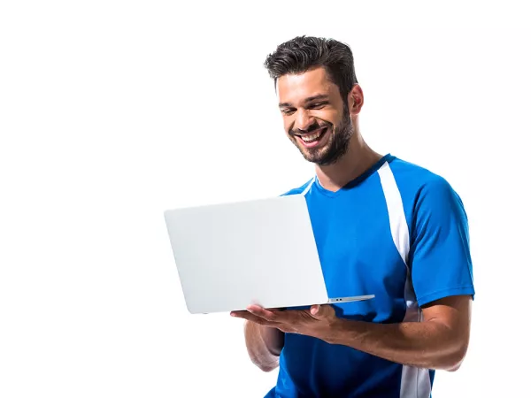 Smiling man using computer